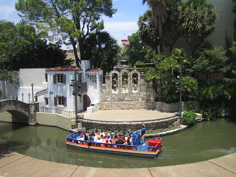 aerial view of San Antonio river walk with a boat