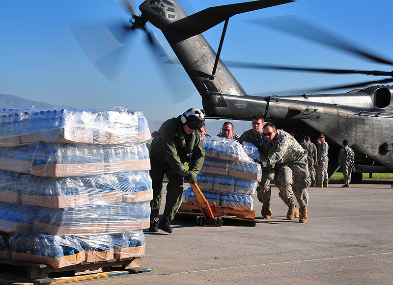 loading supplies onto a helicopter
