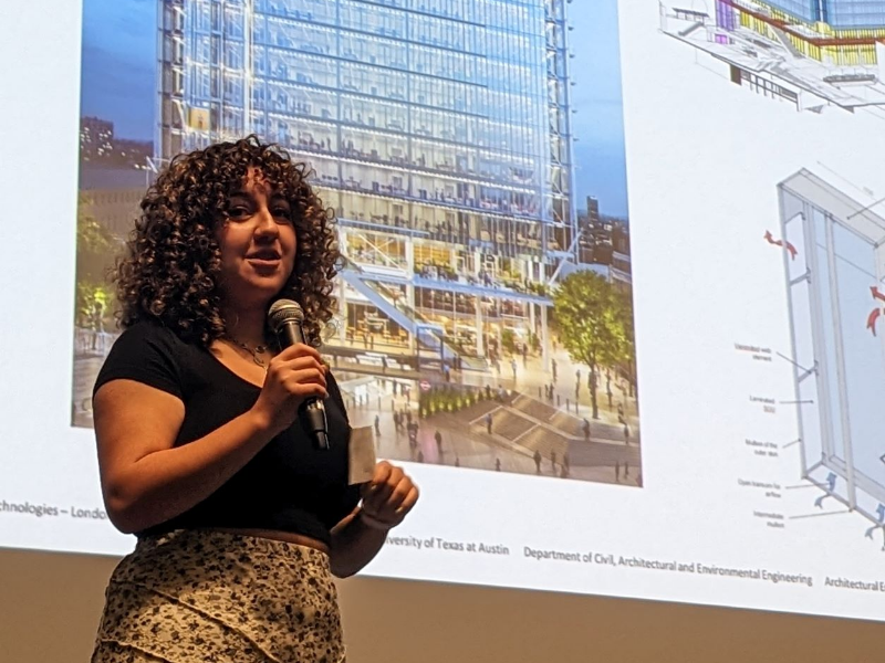 Texas CAEE student giving presentation onstage