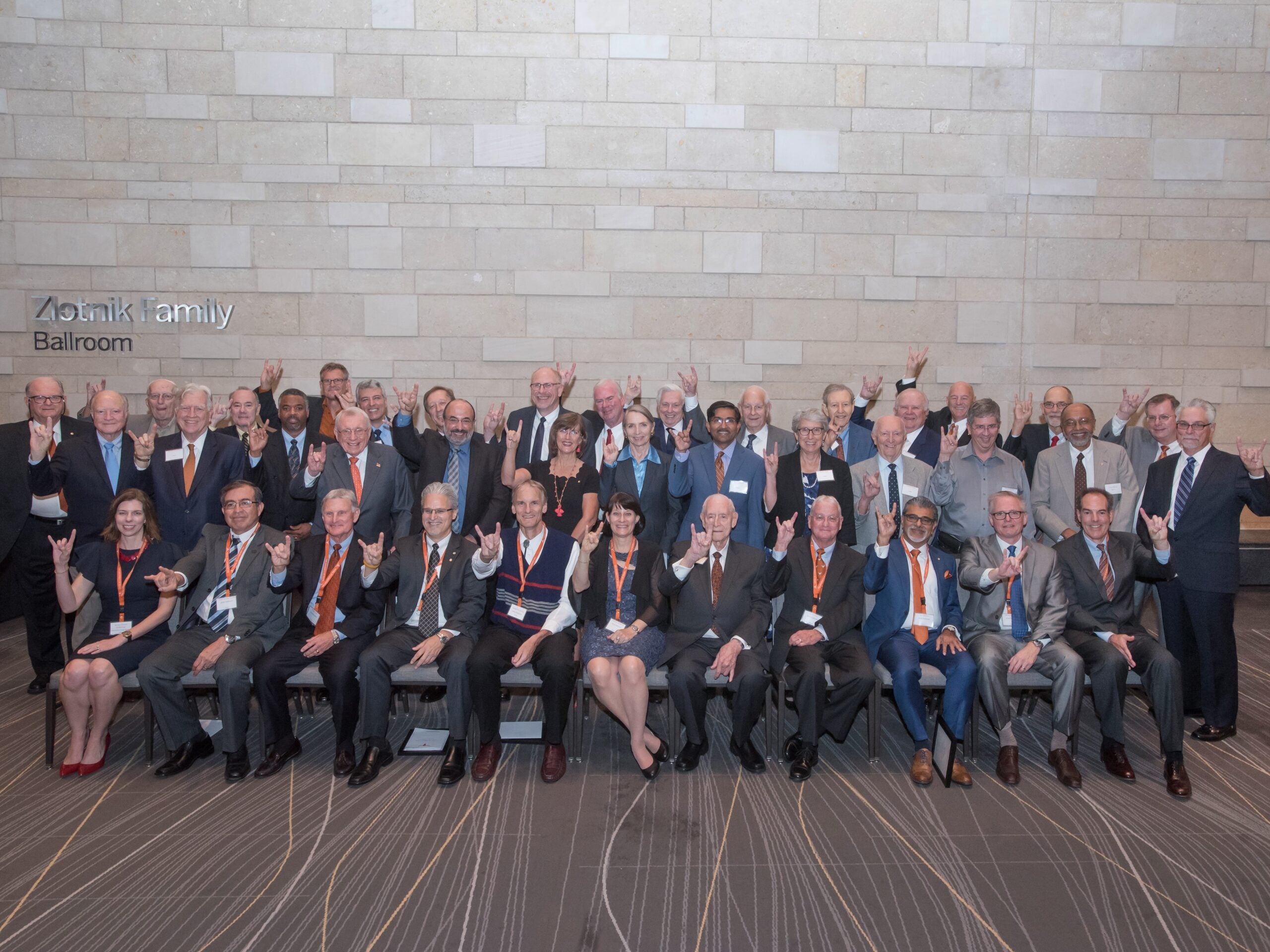 Group of Texas Engineering alumni sitting together at Academy of Distinguished Alumni banquet
