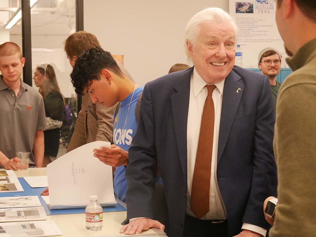 Texas Engineer Thomas Taylor smiling while talking to students