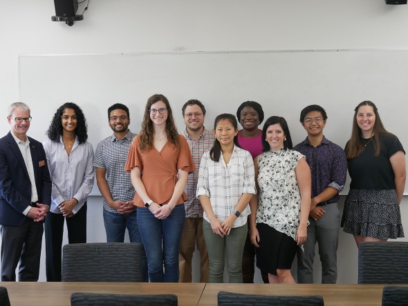 CAEE students and faculty smiling together for a photo