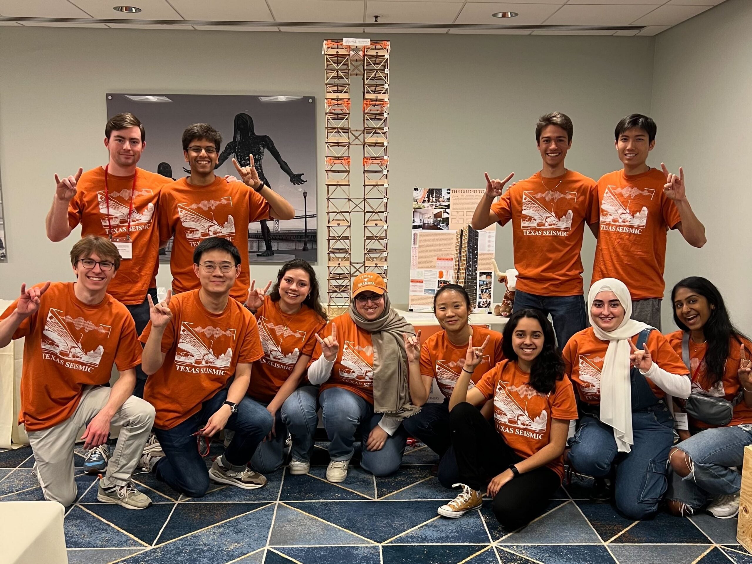 2023 UT CAEE Seismic Design team smiling together in classroom