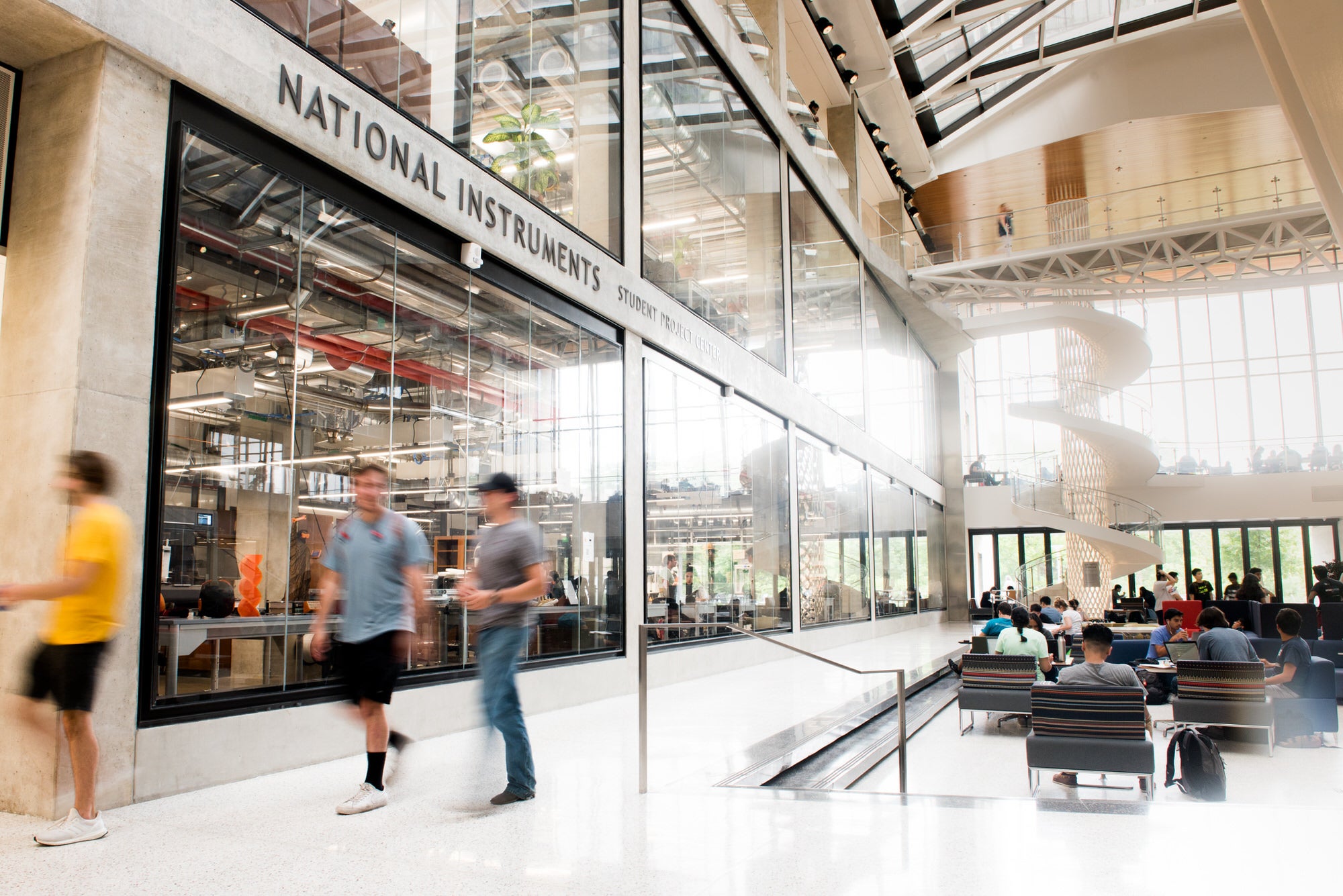 EERC interior commons area with students walking and studying