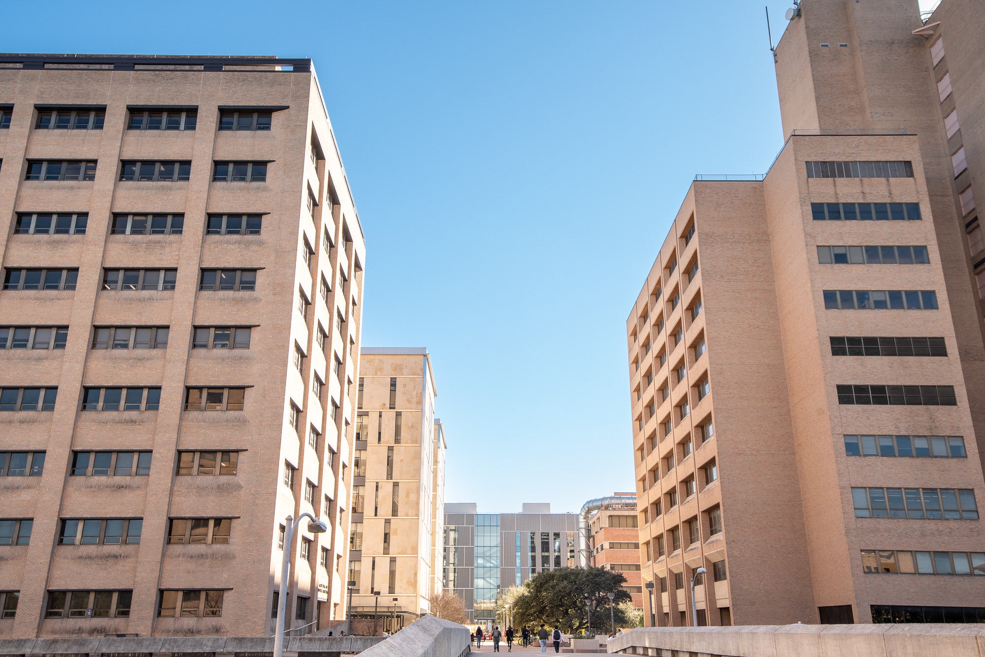Entrance to the Engineering corridor with bridges and buildings occupied by Texas Engineers