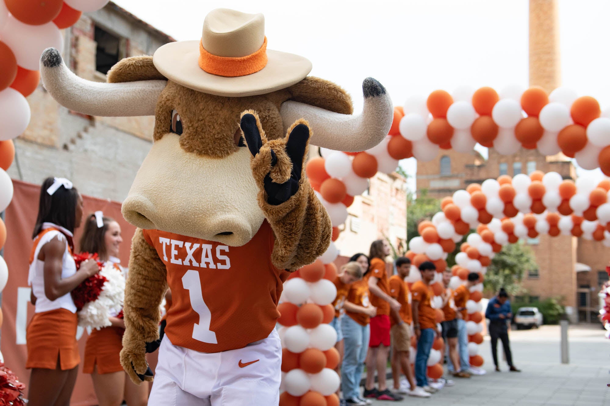 Hook 'Em mascot mugs to camera during the Fariborz Maseeh department naming event for Texas CAEE.