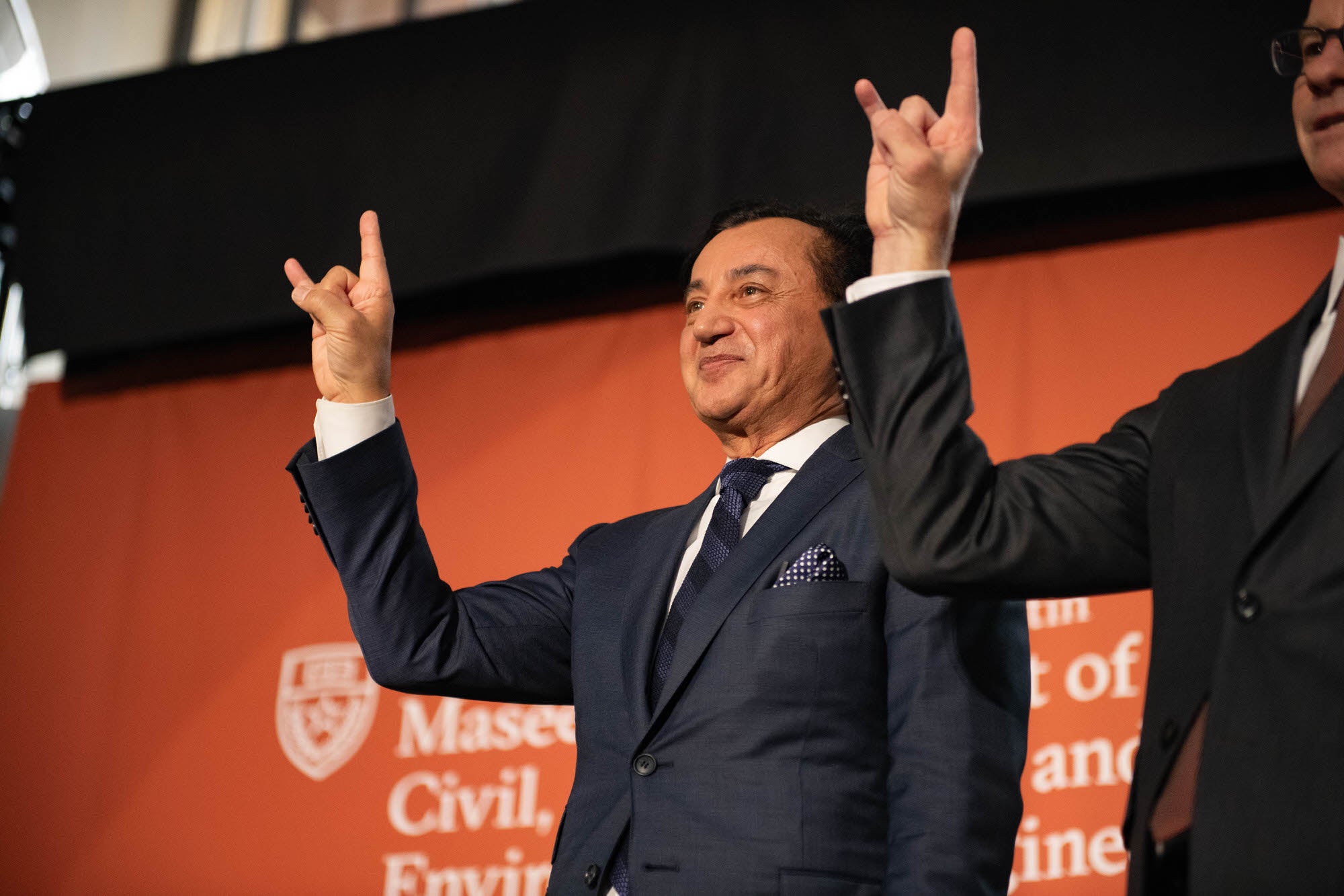 Fariborz hook em during the naming ceremony for the CAEE department.