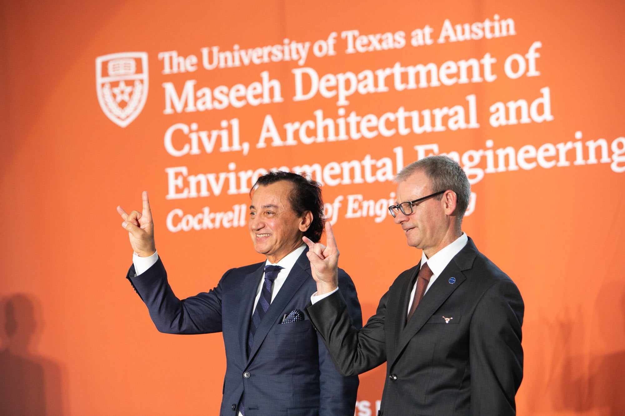 Fariborz Masseh and Bob Gilbert hook em at the Fariborz Maseeh Naming event