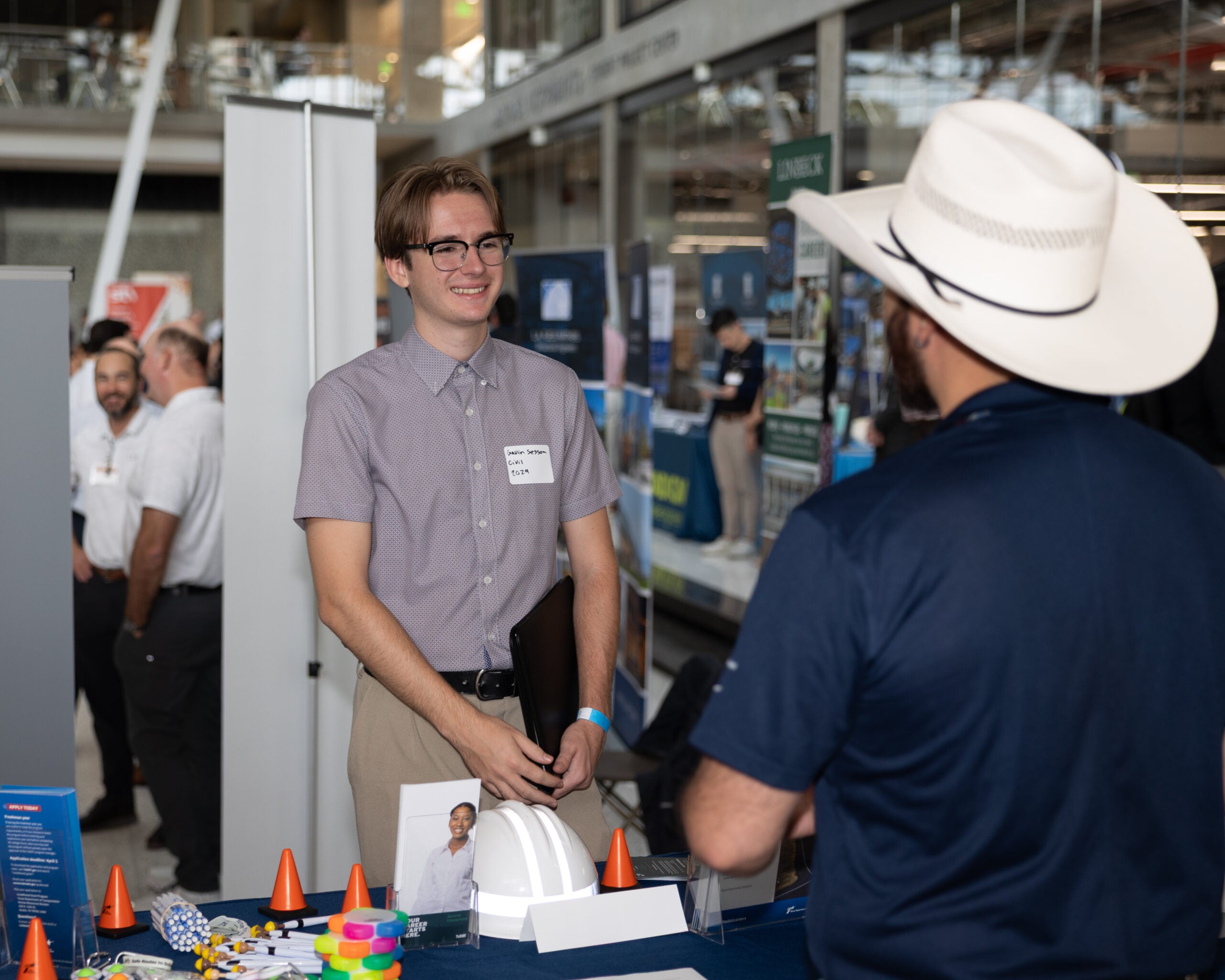 Alumni recruiting at CAEE Industry Open House