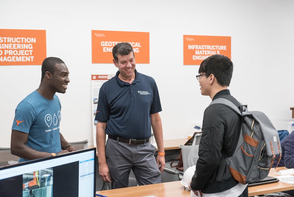 Carlos Caldea meeting with students at the Industry Open House Technical Talk breakouts