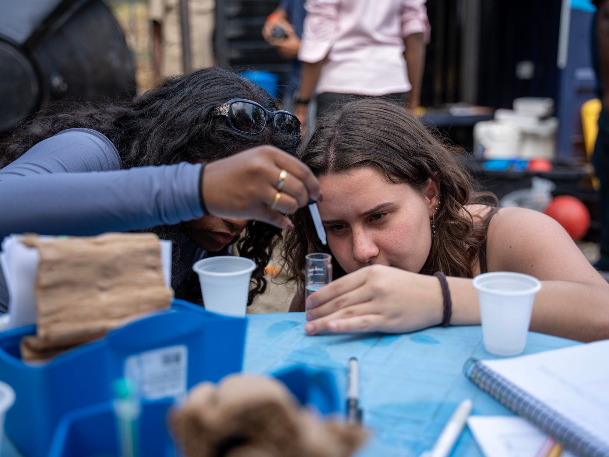 Student doing in field water testing.