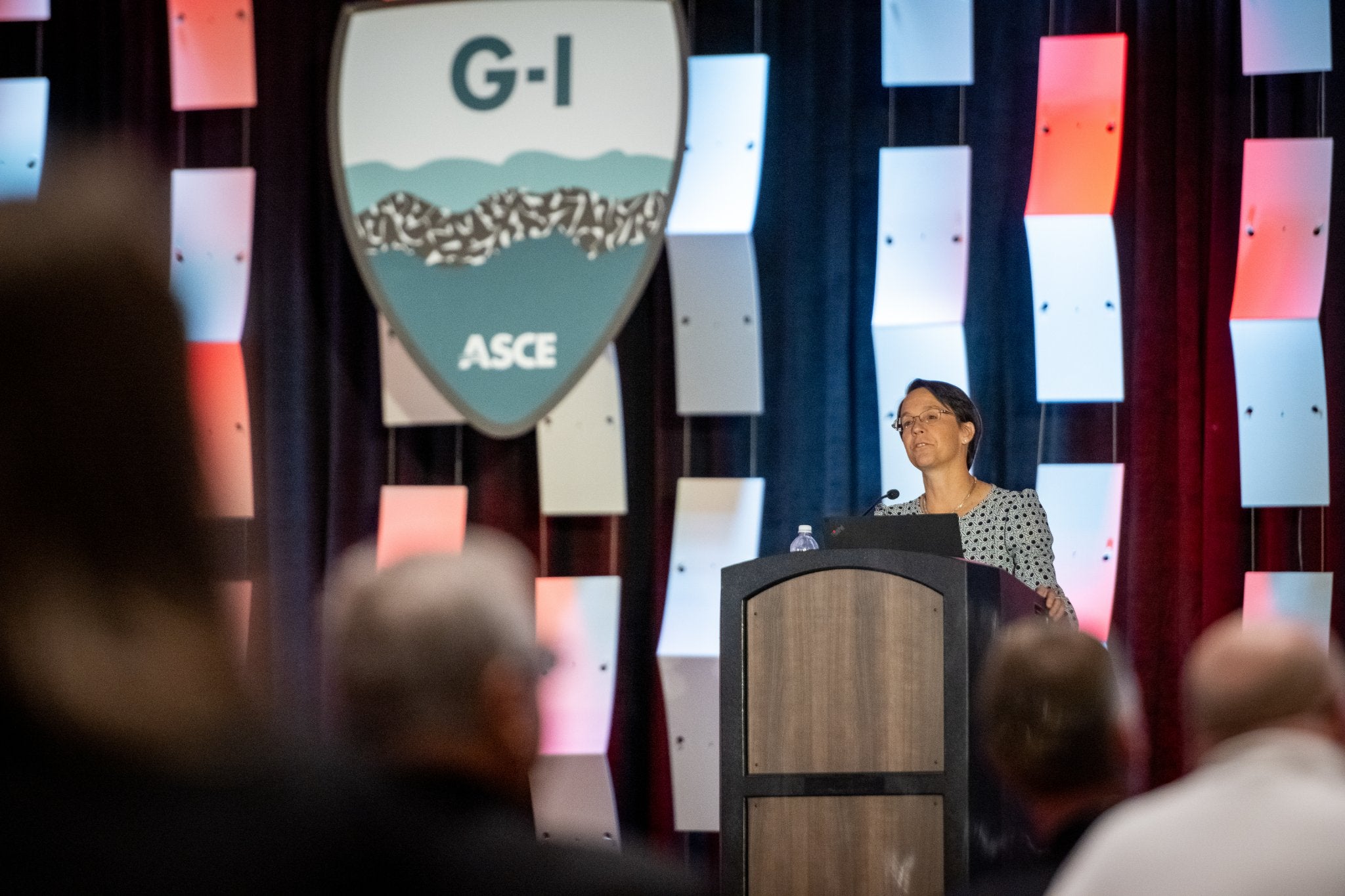 Texas Engineer Ellen Rathje speaking at podium on stage
